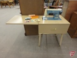 Kenmore 158.750 sewing machine with cabinet and accessories