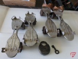 Vintage Winchester roller skates, and Winchester lock with key.