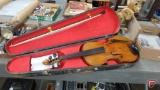 Violin with bow, needs repair, in vintage case.