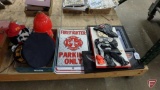 Collection of firefighter items, framed prints, metal signs, hat, hydrant cookie jar, plush toy,