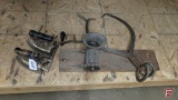 Grinder mounted on wood board, ice tongs, and (2) vintage electric clothes irons. 4 pieces