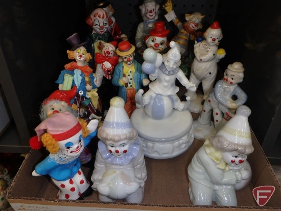 Clowns, figurines, musicals, dolls, table clock. Contents of 4 boxes/row