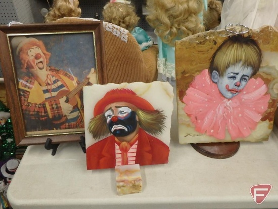 Framed newspaper clip of Poteete, (2) clowns painted on rock, dolls, figurines, masks,