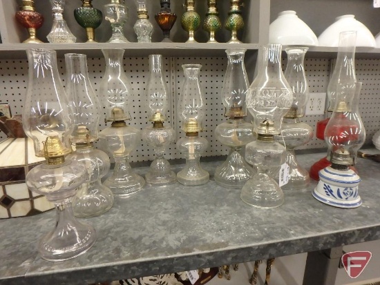 Glass hurricane oil lamps, 14inH to 20inH. 10 pieces