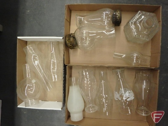 Glass hurricane lamp globes and chimneys, most 9inH, and one bottom piece.