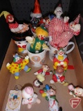 Clown items, dolls, figurines, mugs, musicals, bank, ornaments. Contents of 4 boxes/row