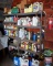 (2) shelves and contents: misc. oils, oil filters, arosal paint cans, anti-freeze, spark plugs,