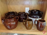 Pottery pieces, some USA, some tops may not match, and (2) mugs. 6 pieces.