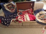 Vintage suitcase with Minnesota State and American flags, in need of repair