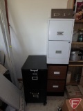 Four metal file/storage cabinets, one on rollers