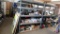 Industrial metal shelving unit with wood shelves, 7ftHx70inWx31inD.