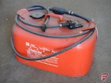 Metal fuel tank with hose, folding Work Gear stool, and IBM canvass tool carrier.