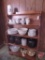 Wood bookcase/display shelf, 50inHx32inW, top shelf is 5.5inD, bottom shelf is 11inD.