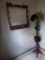 Coat tree, hats, Tasco 2001 binoculars, and gun rack