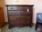 Vintage wood dresser, missing hankie drawers, on wheels, 4drawers, 38inHx42inWx18inD.