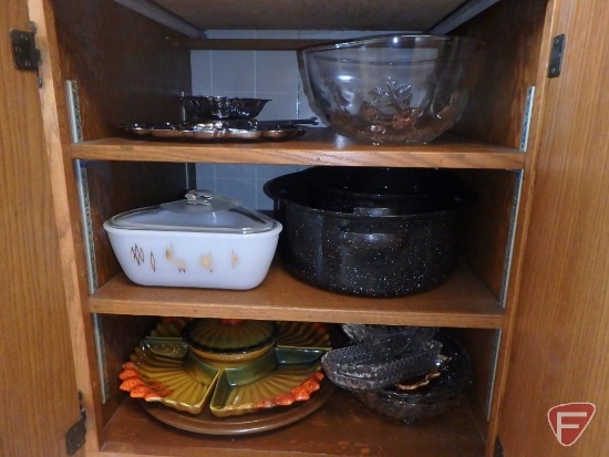 Casserole, enamel roasting tins, trays, relishes, and bowls. Contents of 6 shelves