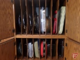 Assortment of trays, cookie sheets, cake pans, muffin tins. Contents of top 2 shelves