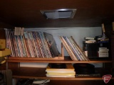 Records, 33s and 45s, and 8track tapes, with metal record holder