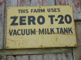 Metal Zero milk tank sign. English on front and French on back. Scratches and rust spots