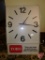 Toro lighted advertising clock with spanish phrase 