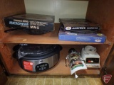 Osterizer food blender, cast iron fry pans, Corningware microwave dishes, and