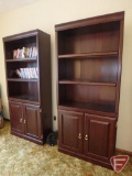 (2) matching bookshelves, both with 2 doors at base