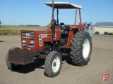 Hesston 80-66 wide front utility tractor, 2930 hours, rock box, canopy