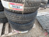 (4) Firestone P235/75 R15 tires