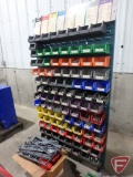 Wheel balancer weight organizer rack with contents: sorted wheel weights