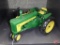 Replica John Deere 730 diesel tractor with commemorative medallion