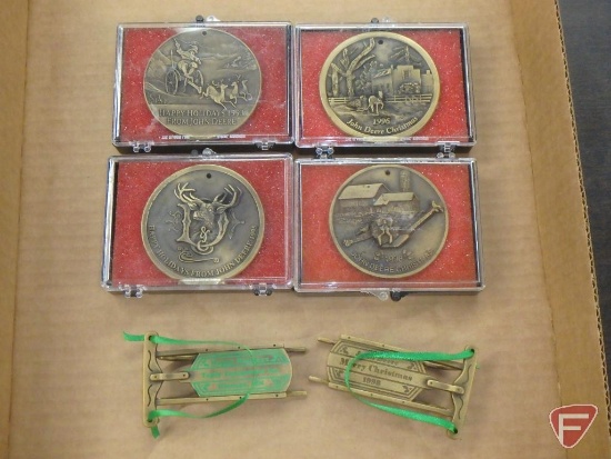 Brass John Deere medallion ornaments-1993,1995,1996,1998; brass sleigh ornament 1998, and