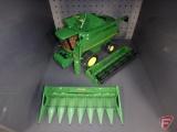 Ertl replica John Deere 9750STS combine with two (2) heads and commemorative medallion