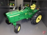 Ertl replica John Deere 4020 diesel tractor with commemorative medallion