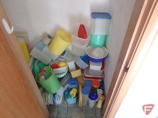 Large assortment of plasticware, mostly Tupperware, various colors.