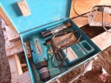 Makita 9.6v cordless drill with metal case, (2) batteries, and charger