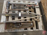 Contents of pallet: mauls, crowbars, steaks, hammer