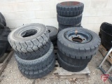 Assorted forklift tires and rims, solid and pneumatic