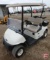 2016 EZ-GO RXV electric golf car with canopy, windshield, and cooler; white
