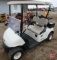 2016 EZ-GO RXV electric golf car with canopy, windshield, and cooler; white
