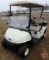 2016 EZ-GO RXV electric golf car with canopy, windshield, and cooler; white