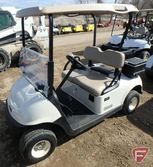 2016 EZ-GO RXV electric golf car with canopy, windshield, and cooler; white