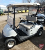 2016 EZ-GO RXV electric golf car with canopy, windshield, and cooler; white