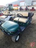 2008 EZ-GO MPT 1200 gas utility vehicle with manual dump box, headlights and grill guard, green