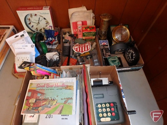 Alarm clocks, fishing items, bird clock, 16 gauge Remington partial box, lead shot bags, maps