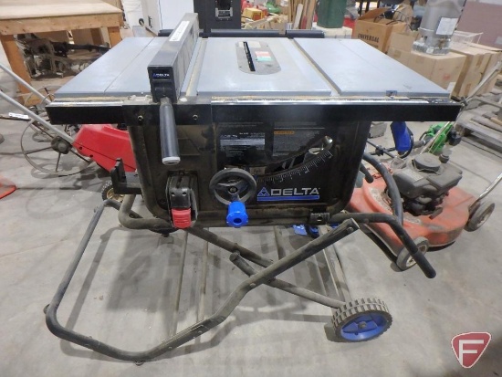 10" Delta table saw with folding stand on wheels, model 36-6022, 120v