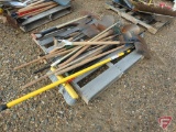 Shovels, rake, hoe, shop broom, pick ax, and potato fork