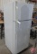 GE refrigerator 17.9 cu. ft. top freezer refrigerator, slight odor, been closed