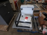 First aid kit in metal box, metal framed table, whiteboard, plastic tray