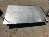 Metal sheeting, both sheets have holes drilled in them