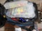 Okeechobee Fats fishing tackle bag and contents: lures, jigs, spinners, reel line, bobbers